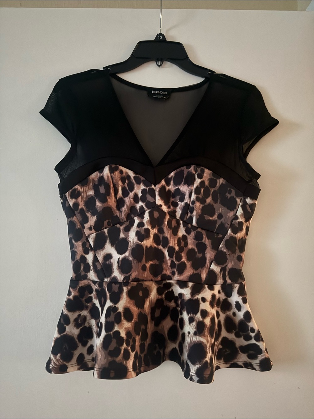 bebe Black Sheer Yoke Leopard Print Peplum Top